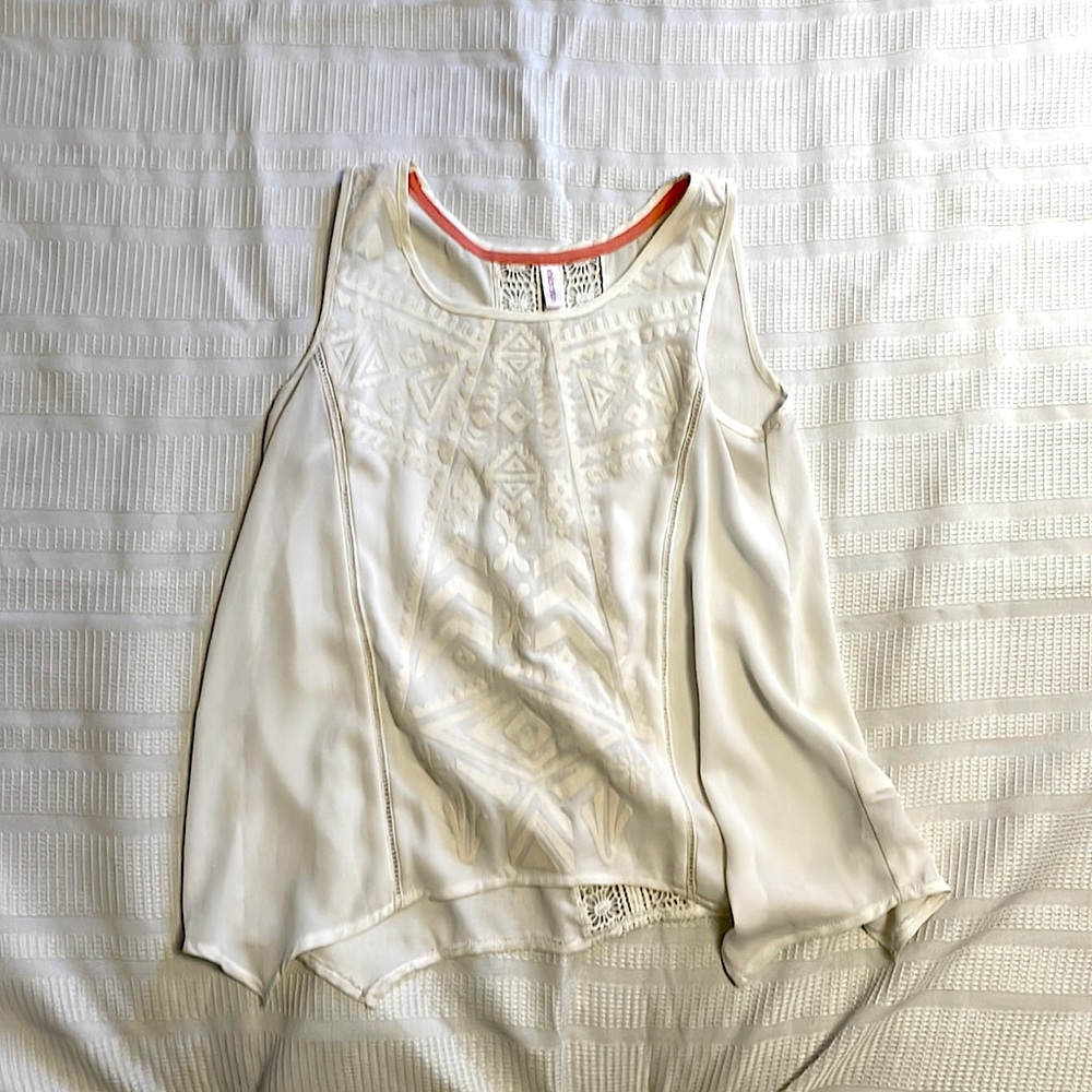 White flowy top.